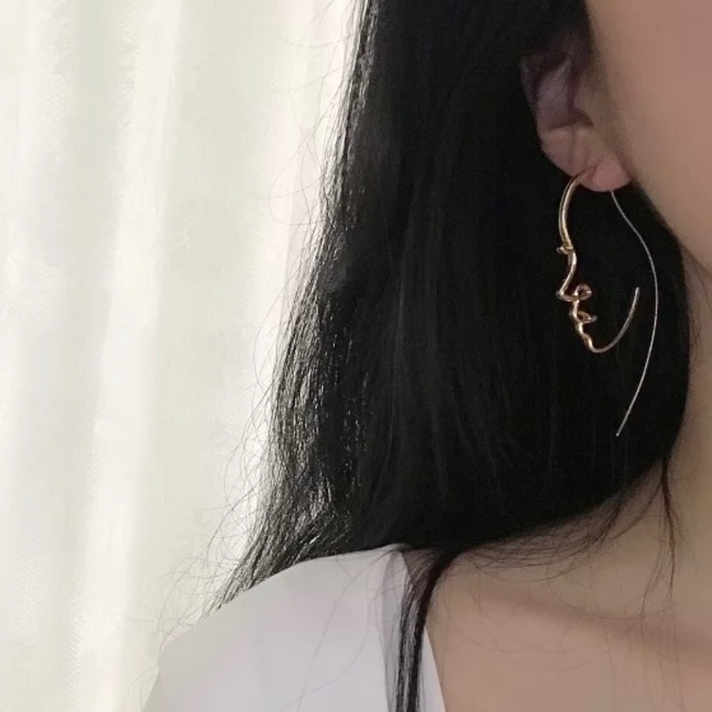 Gold Hollow Face Design Earrings